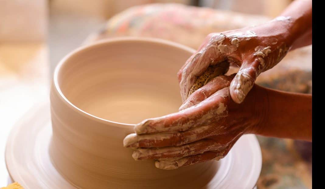 a person making pottery